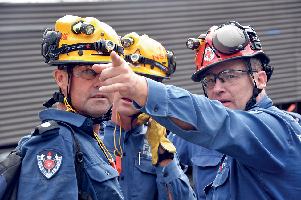 Photograph of three members of the emergency team.