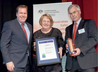 Photograph of the Hon Robert McClelland with award winners from ACT Community Services Directorate