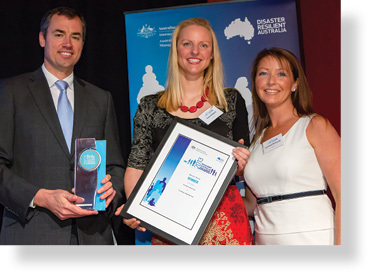 A photo of Hon. Michael Keenan MP with award winners Kate Riddell and Jemima Richards