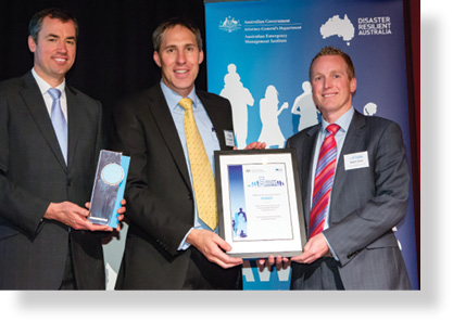 A photo of Hon. Michael Keenan MP with award winners Rohan Hamden and Adam Gray